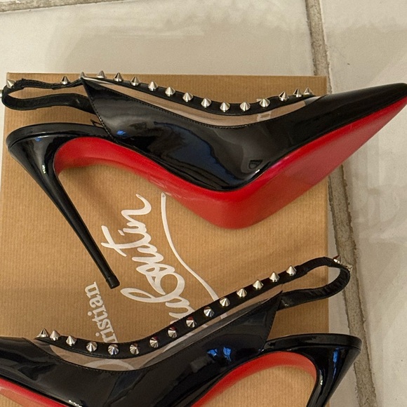 Christian Louboutin Shoes - Christian Louboutin Black Heels with Red Soles and Metallic Studs